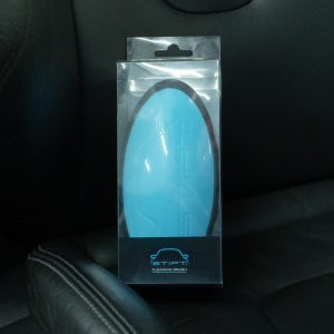 Stipt Cleaning Brush in verpakking op autostoel, cleaning brush voor interieur reiniging